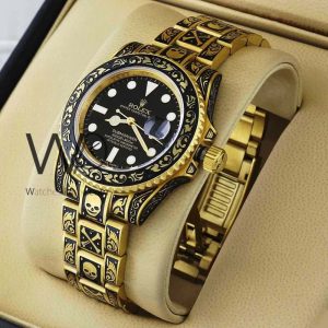 ساعه من rolex تعمل بعدادات بلون اسود وسير دهبى &اسود  من المعدن