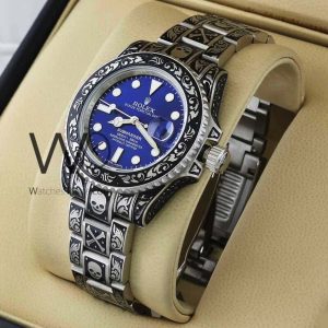 ساعه من rolex تعمل بعدادات بلون ازرق وسير فضى&اسود  من المعدن