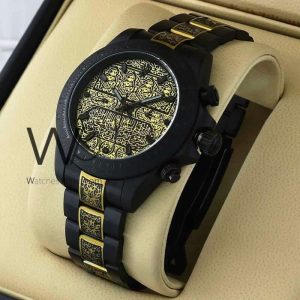 ساعه من rolex تعمل بعدادات بلون اسود وسير اسود&دهبى من المعدن