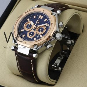Guess Collection watch featuring a refined brown leather belt
