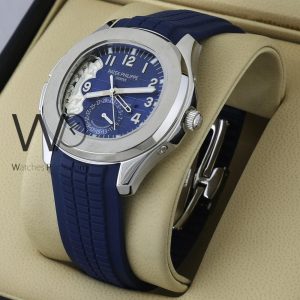 Patek Philippe blue-dial watch with a modern blue rubber strap